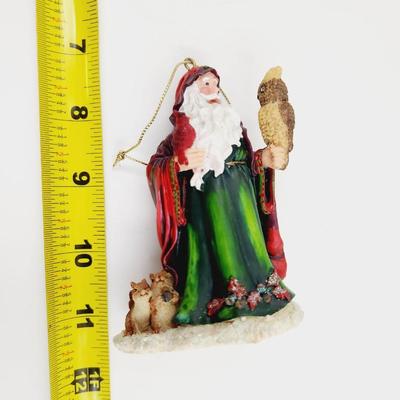 FATHER CHRISTMAS W/ AN OWL ORNAMENT