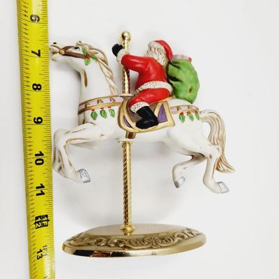 COLLECTORS SANTA ON CAROUSEL HORSE W/ BRASS BASE