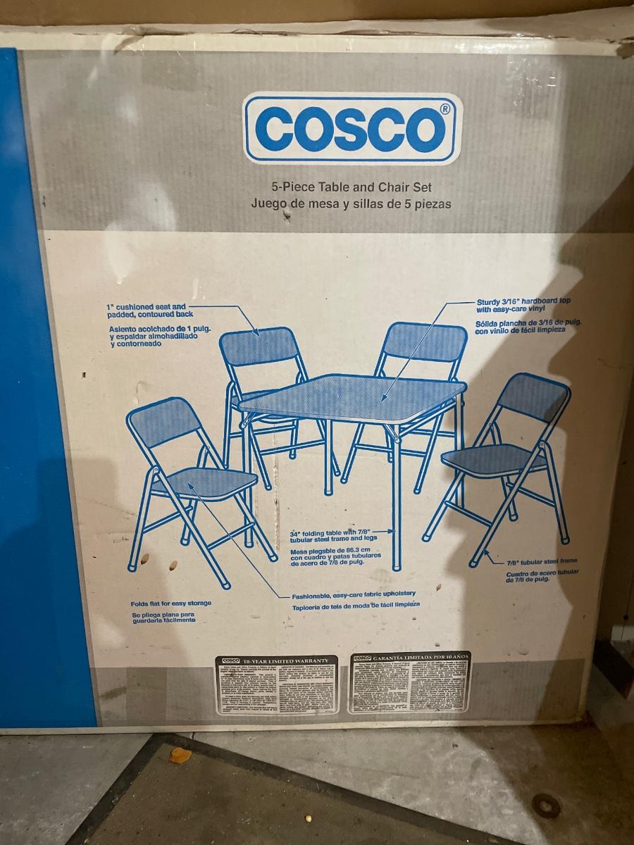 Cosco table and 4 chairs in box