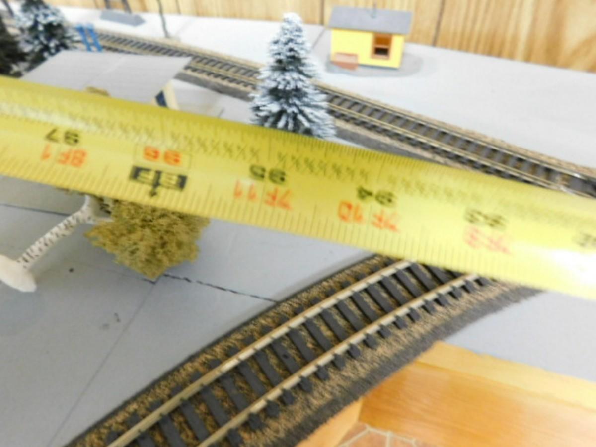 Large Model Train Village and Track with Trains, Platform, and Switch