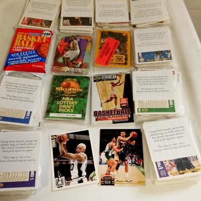 LOT 1  FIFTY PACKS OF VINTAGE BASKETBALL CARDS