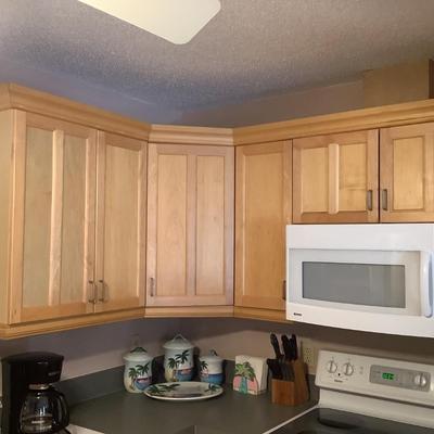Above stove construction grade cabinets