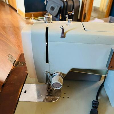 Sears Kenmore Sewing machine in cabinet
