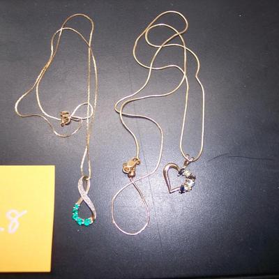 Two Gemstone Pendants on Gold chains