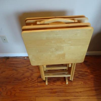 LOT 19. WOOD TV TRAY TABLE SET OF FOUR