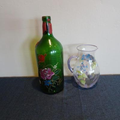 LOT 40. WINE BOTTLE AND HAND PAINTED PITCHER