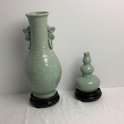 Lot 8425  Two Vintage Chinoiserie Porcelain Celadon Vases