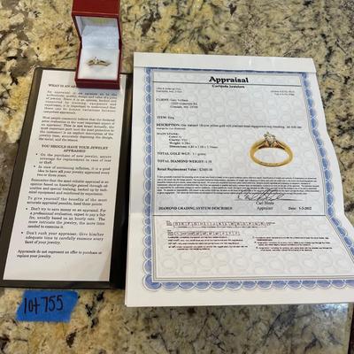 14kt gold with platinum head and marquise cut diamond comes with appraisal