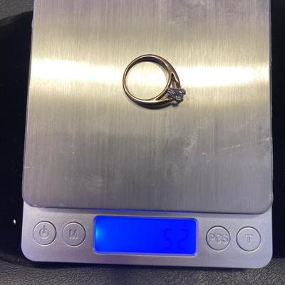 14kt gold with platinum head and marquise cut diamond comes with appraisal