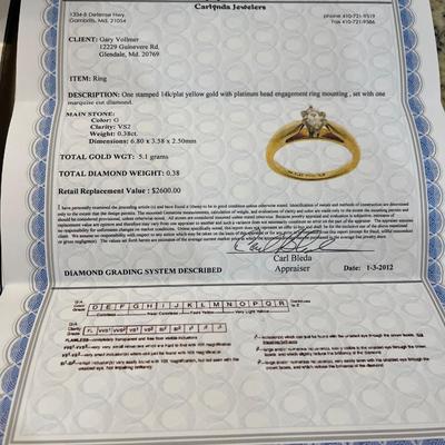14kt gold with platinum head and marquise cut diamond comes with appraisal