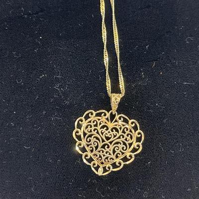 14kt gold chain with heart pendant
