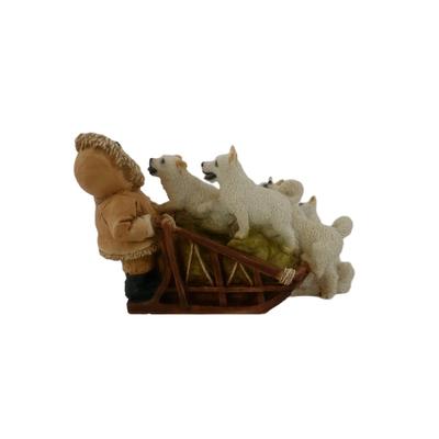 Vintage Laughing Eskimo with Dogs Figurine 