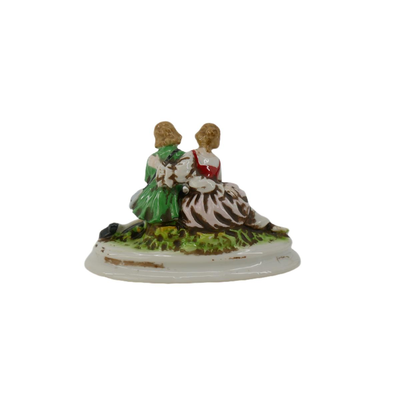 Couple with Dog Figurine