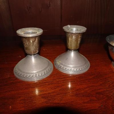 LOT 107. SILVER PLATE AND WEIGHTED STERLING SILVER CANDLE HOLDERS