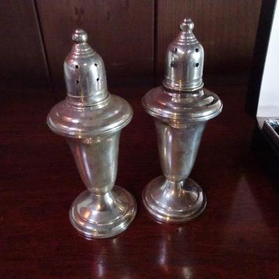 LOT 122. STERLING SILVER SALT AND PEPPER SHAKERS