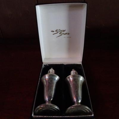 LOT 122. STERLING SILVER SALT AND PEPPER SHAKERS