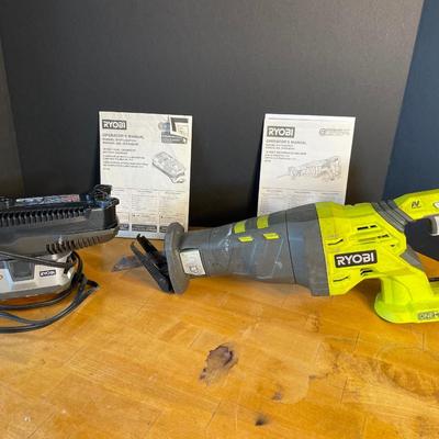Lot 2 Reciprocating saw with Battery & Charger