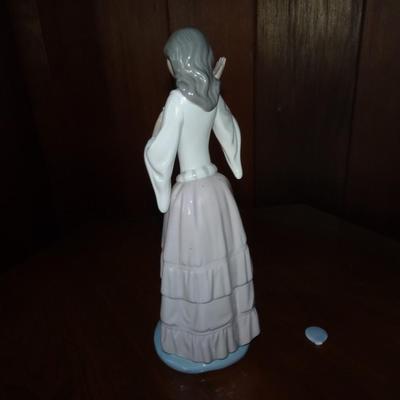 LOT 166. NAO FIGURINE