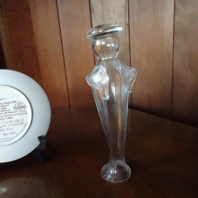 LOT 167. HIBEL PLATE AND ANGEL FIGURAL BOTTLE