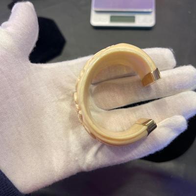 18kt gold and genuine bone bangle