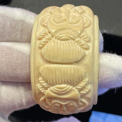 18kt gold and genuine bone bangle