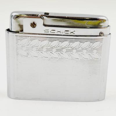 VINTAGE SCHICK SILVER TONED BUTANE LIGHTER