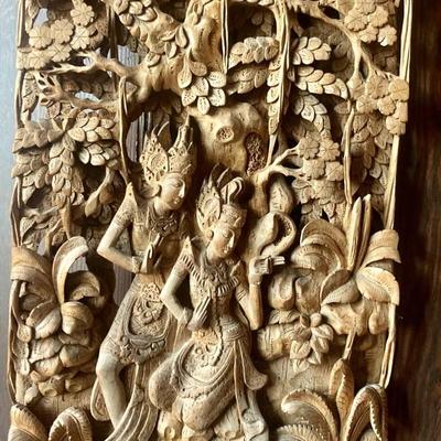 Carved wood wall hanging