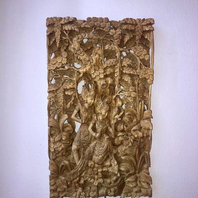Carved wood wall hanging