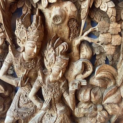 Carved wood wall hanging