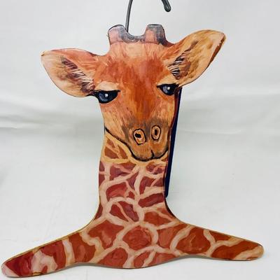 Wood giraffe clothes hanger