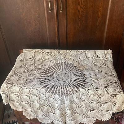 Antique crocheted round table cover