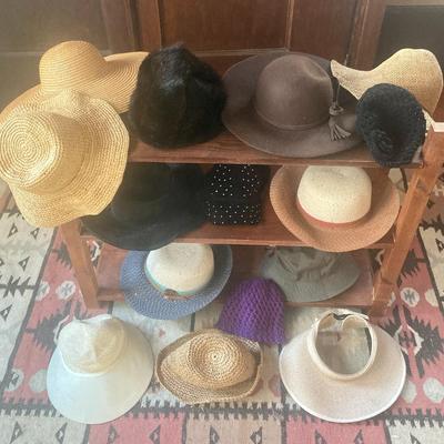 Large grouping of various styles of hats