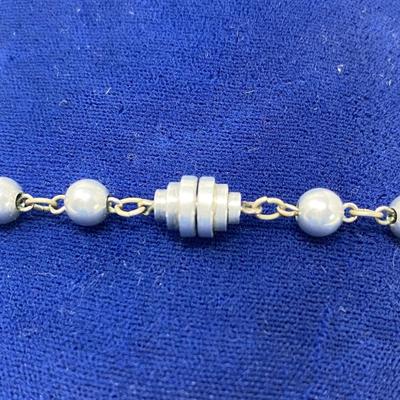 Large strand silver beaded necklace