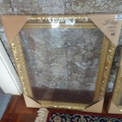 LOT 186. THREE GOLD PICTURE FRAMES
