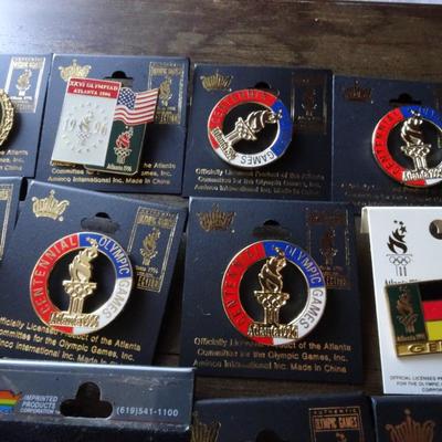LOT 205. COLLECTION OF ATLANTA OLYMPIC PINS AND HAT
