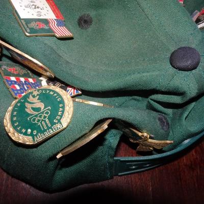 LOT 205. COLLECTION OF ATLANTA OLYMPIC PINS AND HAT