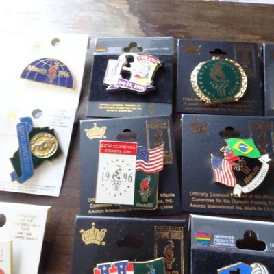 LOT 205. COLLECTION OF ATLANTA OLYMPIC PINS AND HAT
