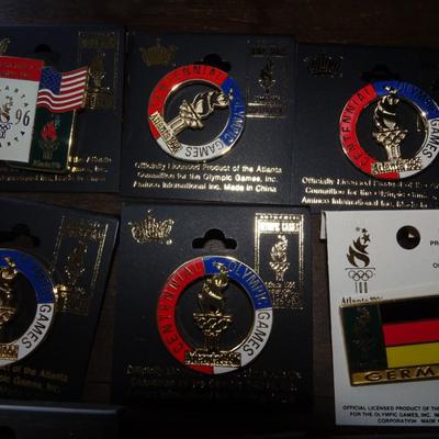 LOT 205. COLLECTION OF ATLANTA OLYMPIC PINS AND HAT