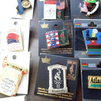 LOT 205. COLLECTION OF ATLANTA OLYMPIC PINS AND HAT