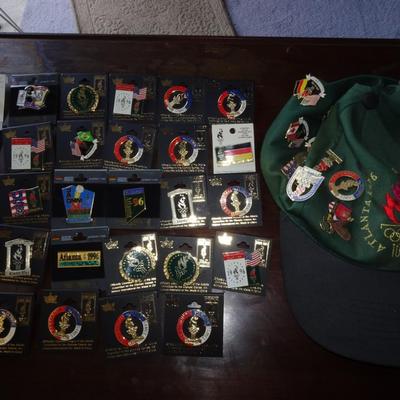 LOT 205. COLLECTION OF ATLANTA OLYMPIC PINS AND HAT