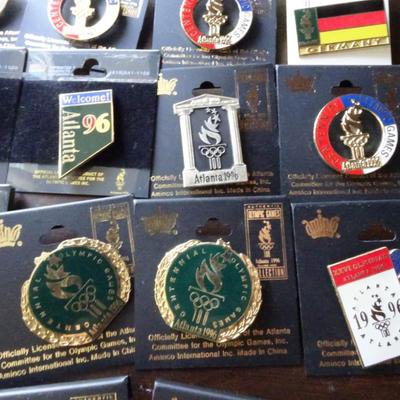 LOT 205. COLLECTION OF ATLANTA OLYMPIC PINS AND HAT
