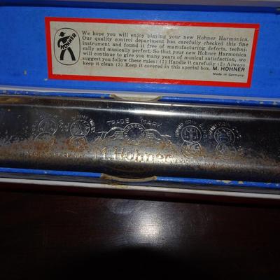 LOT 207. MARINE BAND HORNER  HARMONICA AND SIX USED WALLETS