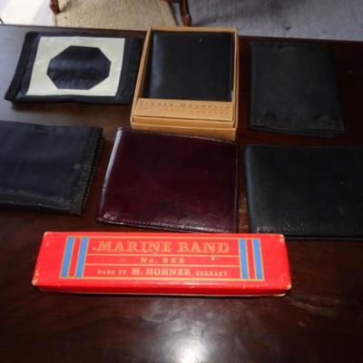 LOT 207. MARINE BAND HORNER  HARMONICA AND SIX USED WALLETS
