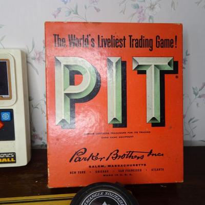LOT 243. VINTAGE BASKETBALL ELECTRONIC GAME, VINTAGE PIT GAME AND MISC GAMES