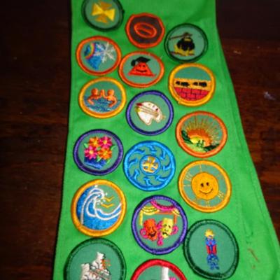 LOT 247. VINTAGE GIRL SCOUT SASH AND TWO MARACAS