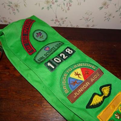 LOT 247. VINTAGE GIRL SCOUT SASH AND TWO MARACAS