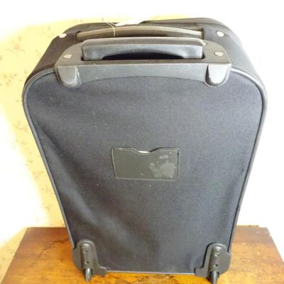 LOT 259. ROLLER SUITCASE