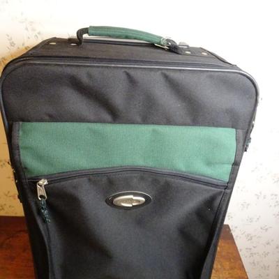 LOT 260. ROLLER SUITCASE
