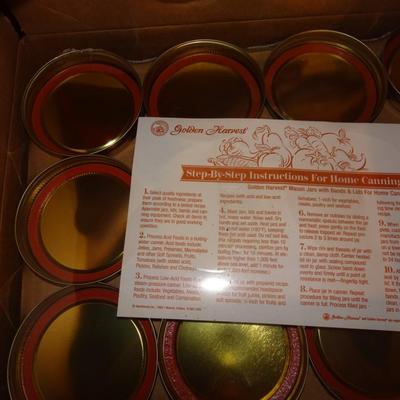 LOT 333. TWO BOXES OF UNUSED MASON JARS WITH LIDS