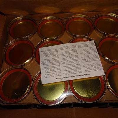 LOT 333. TWO BOXES OF UNUSED MASON JARS WITH LIDS
